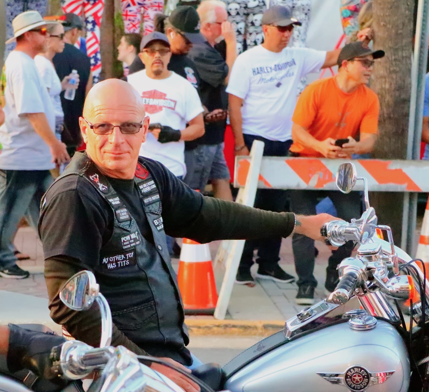 Biker on Main Street with Funny Patches